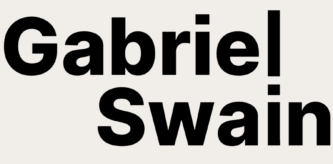 Gabriel Swain monogram logo of first and last name, with black bold font and off white background.